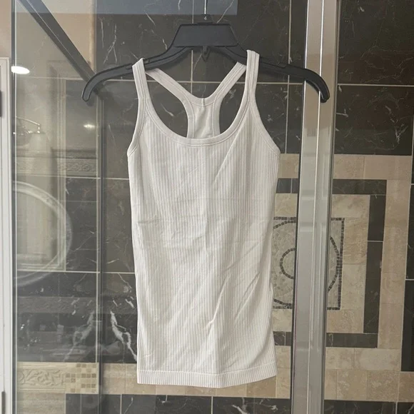 Lululemon White Ribbed Tank Top, sizing tag cut off, size 2. - Picture 1 of 3